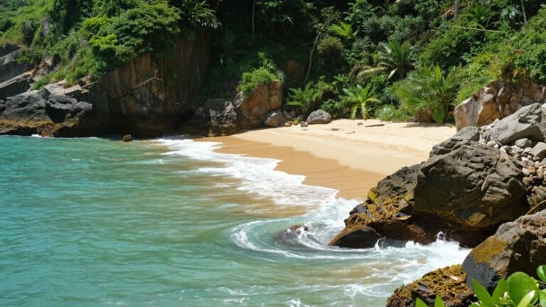 Secluded Brittany beach with golden sand and turquoise water.