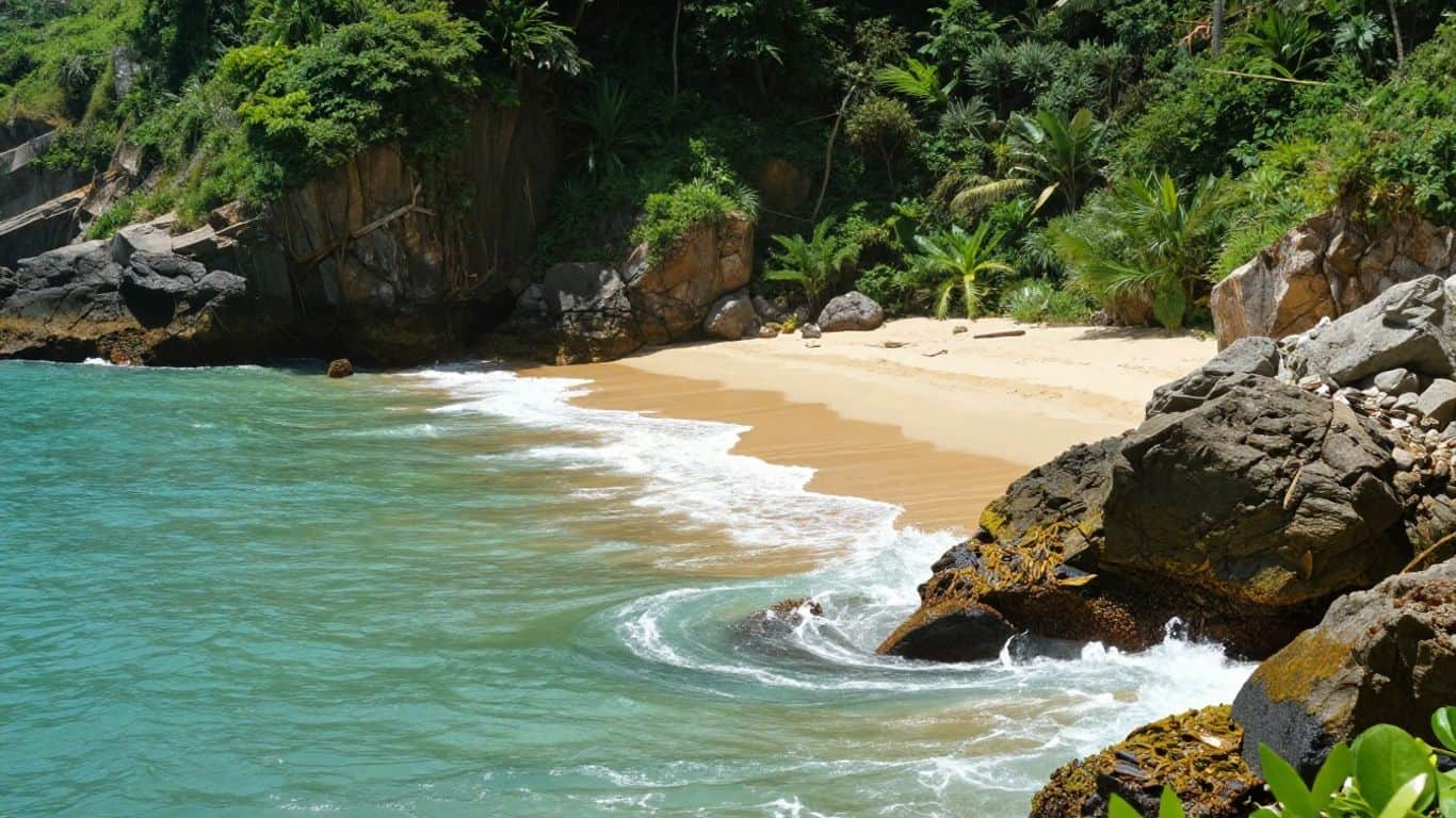 Secluded Brittany beach with golden sand and turquoise water.