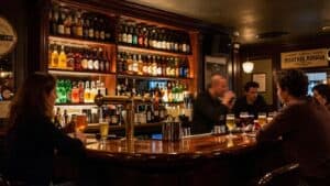 Craft beer taps and bottles in a Parisian bar.
